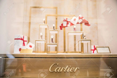 Cartier 2015 X'mas metal stand with white gift boxes for window display