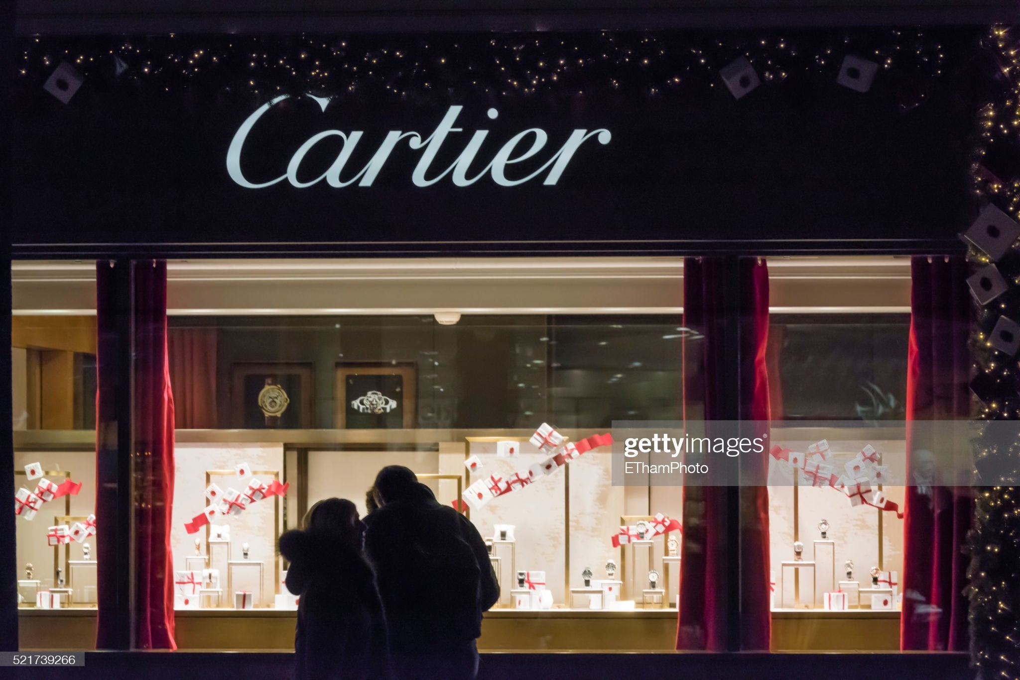 Cartier 2015 X'mas metal stand with white gift boxes for window display