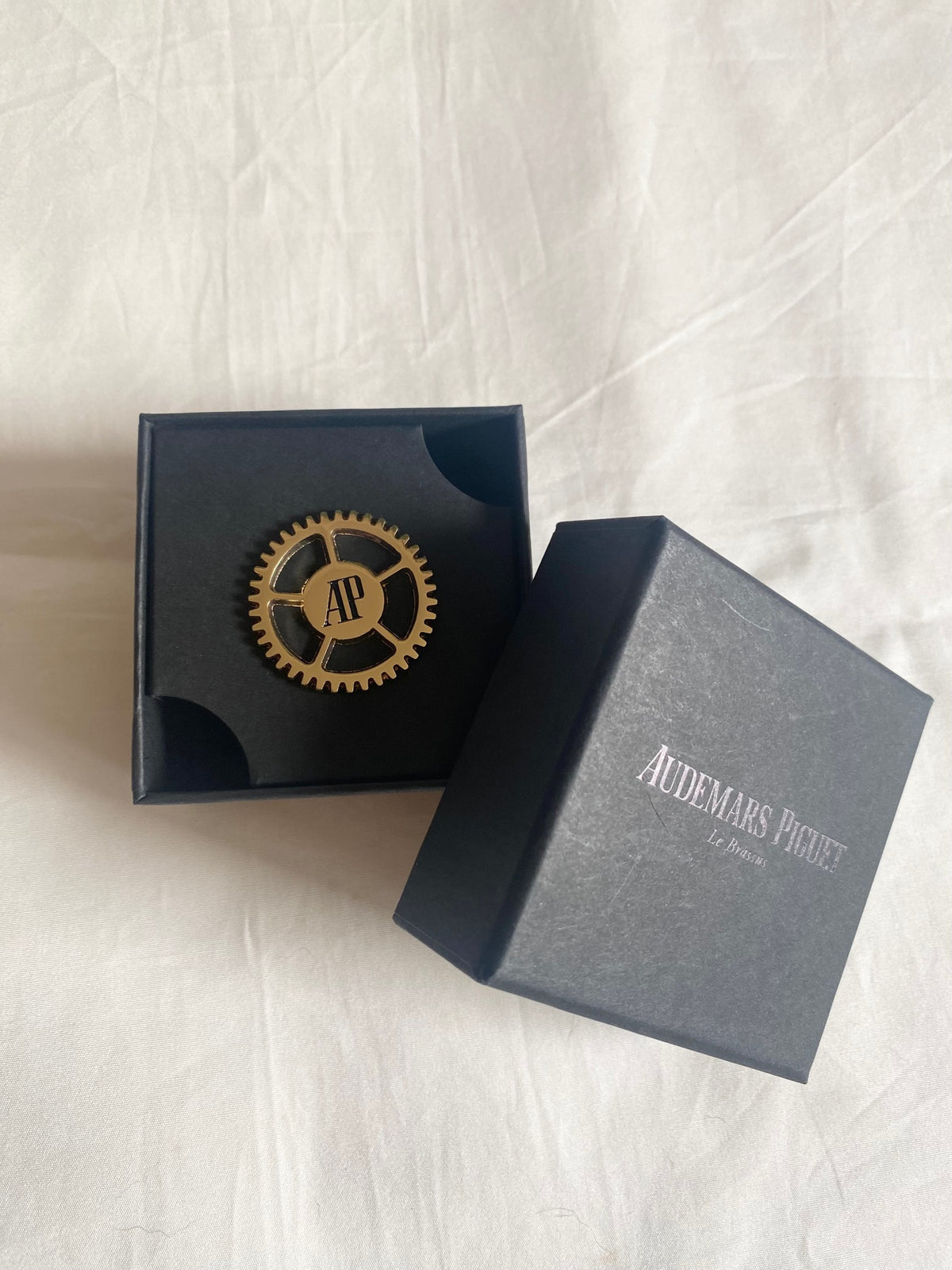 Audemars Piguet 2026 Salone Del Mobile AP logo movement brooch