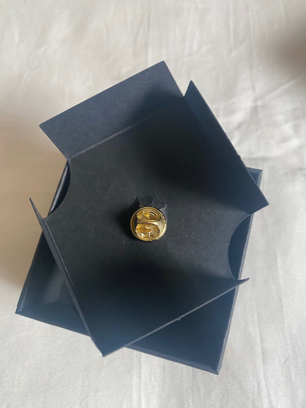 Audemars Piguet 2026 Salone Del Mobile AP logo movement brooch