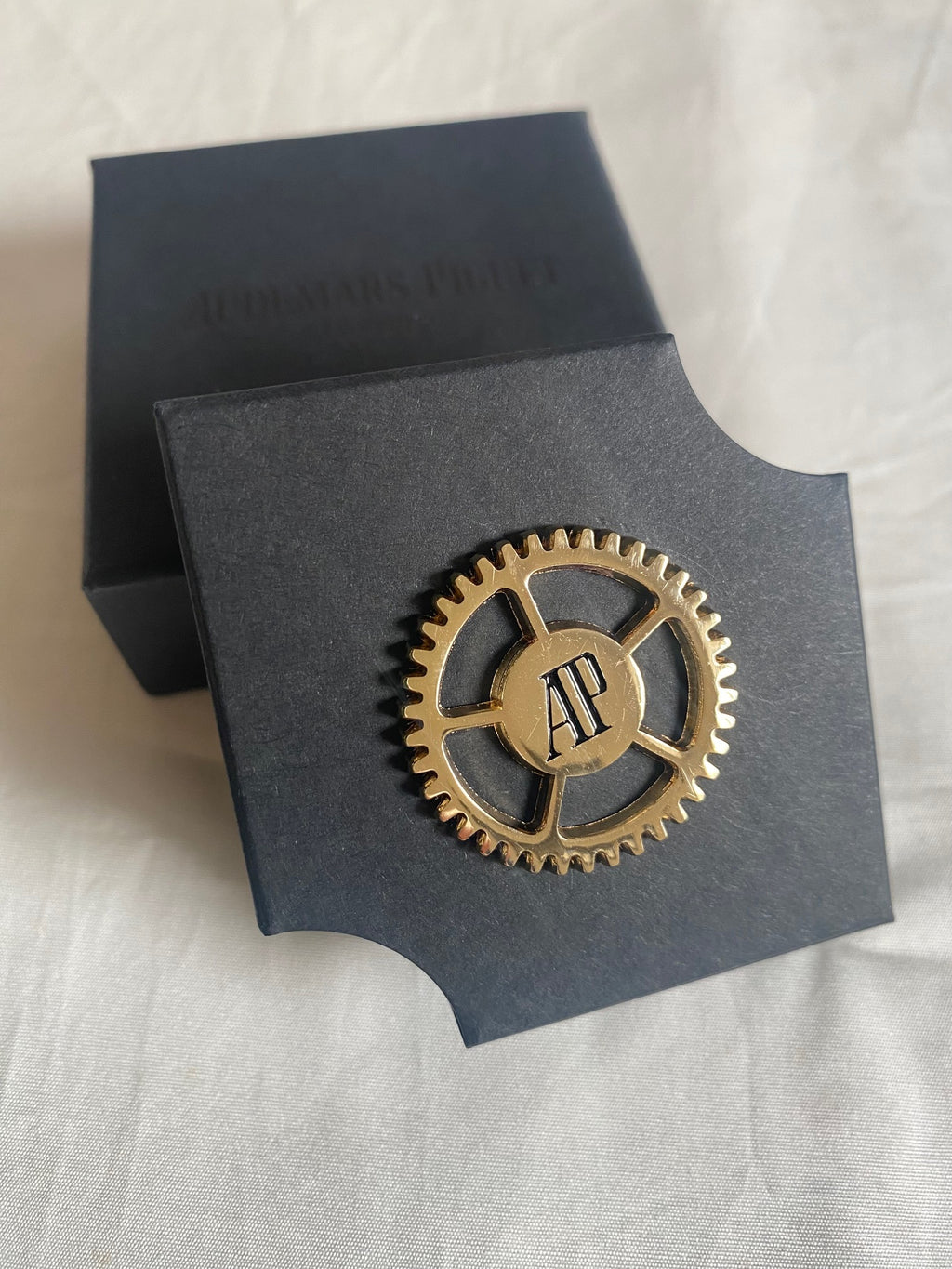 Audemars Piguet 2026 Salone Del Mobile AP logo movement brooch
