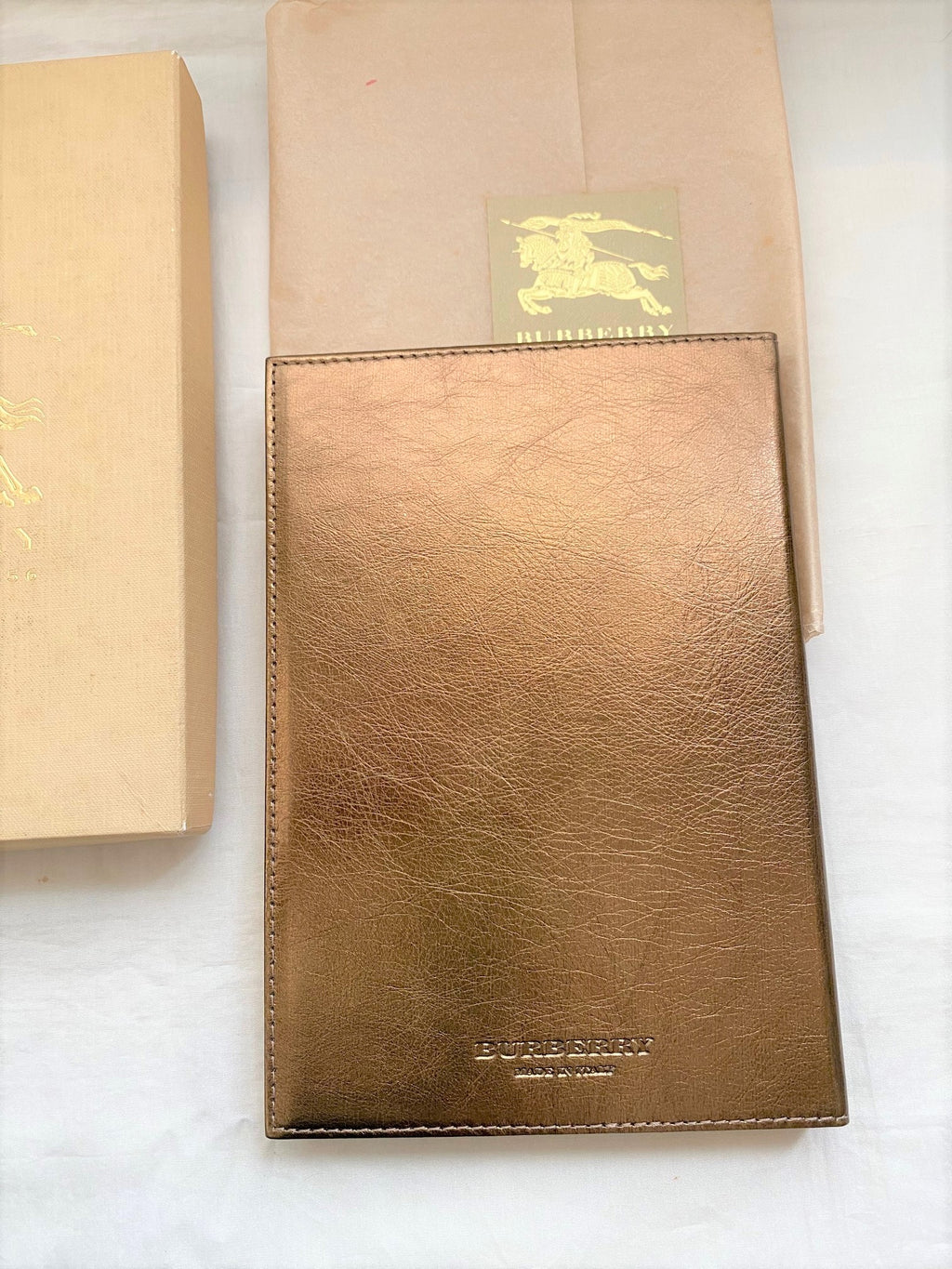 Burberry metallic gold leather cover notebook