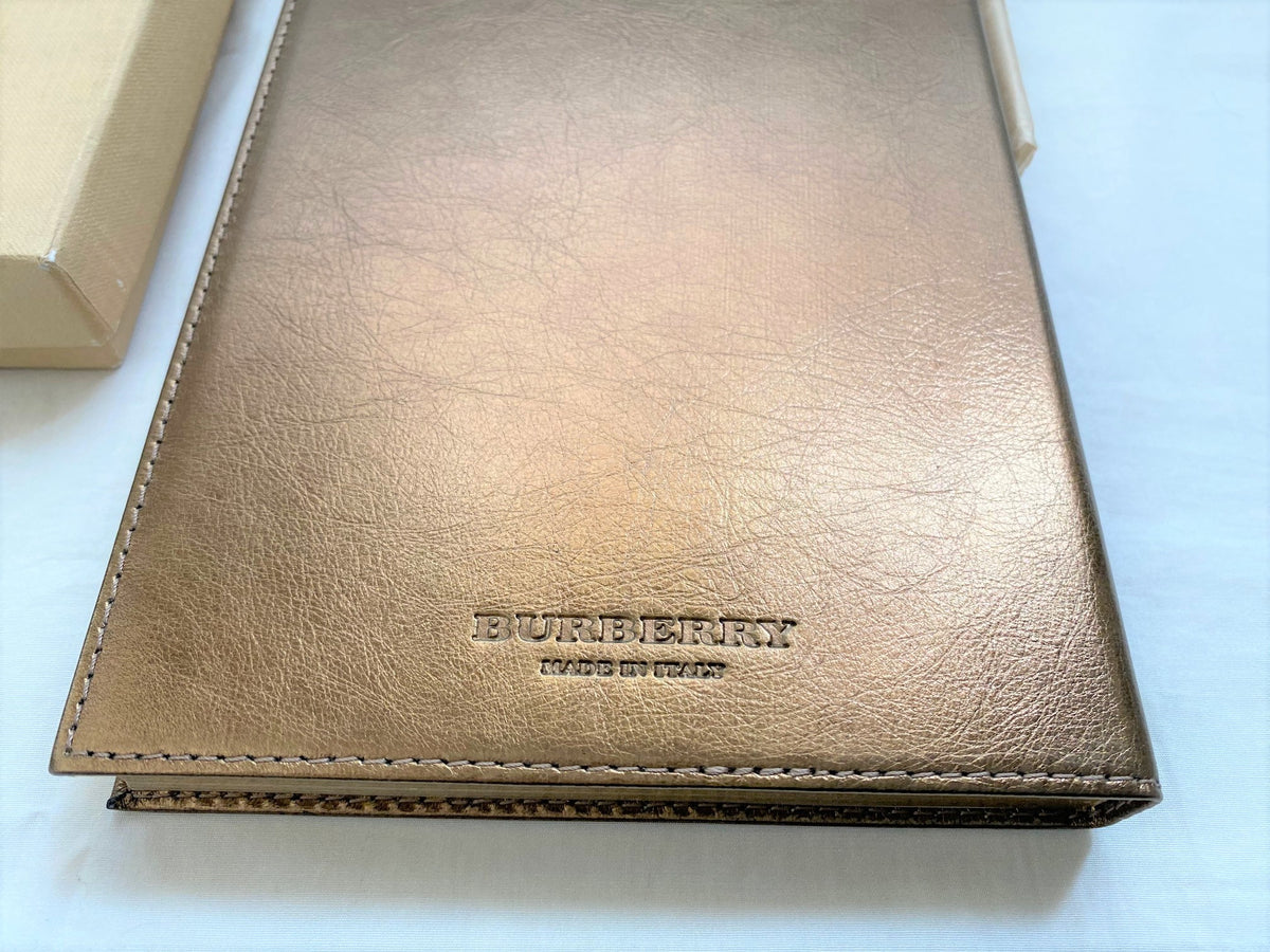 Burberry metallic gold leather cover notebook