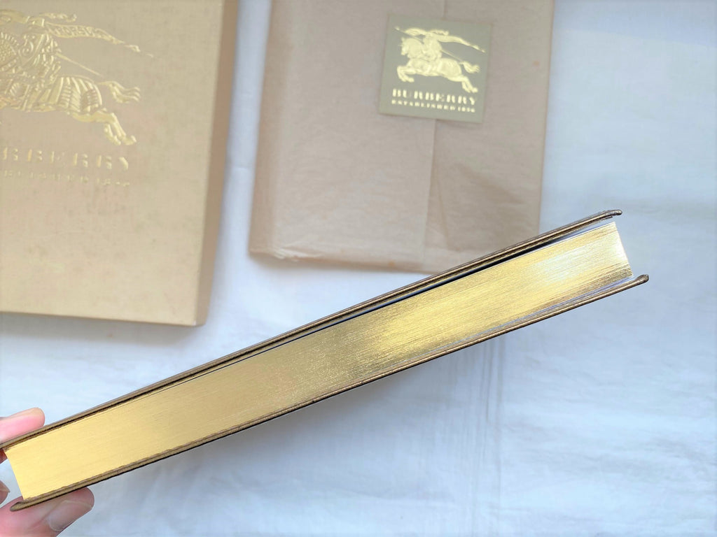 Burberry metallic gold leather cover notebook