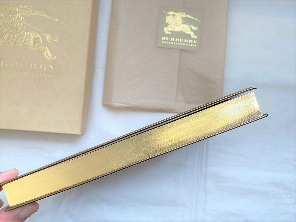 Burberry metallic gold leather cover notebook