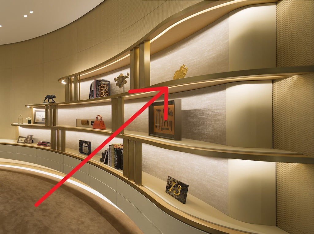 Cartier 2019 gold family crest stand for store display