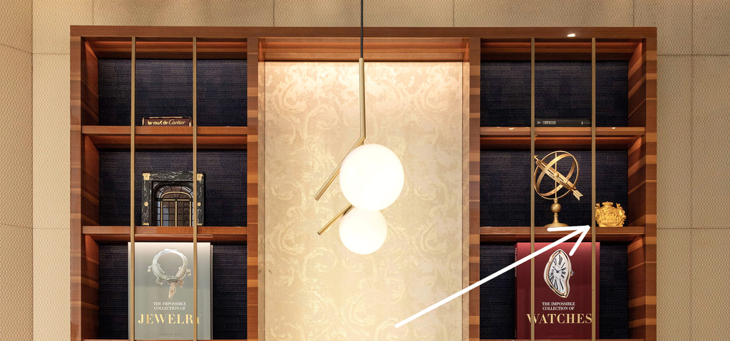 Cartier 2019 gold family crest stand for store display