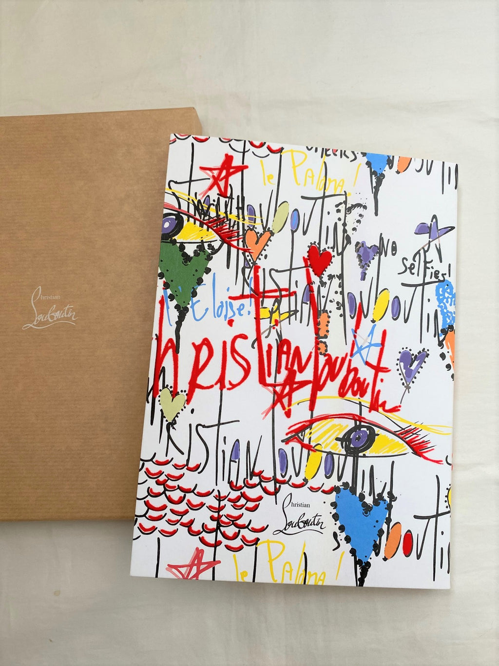 Christian Louboutin Loubitag artwork print notebook