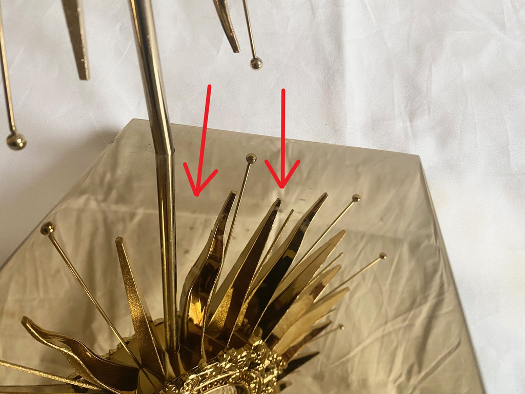 Dior 2024 christmas sun star gold metal stand for window display