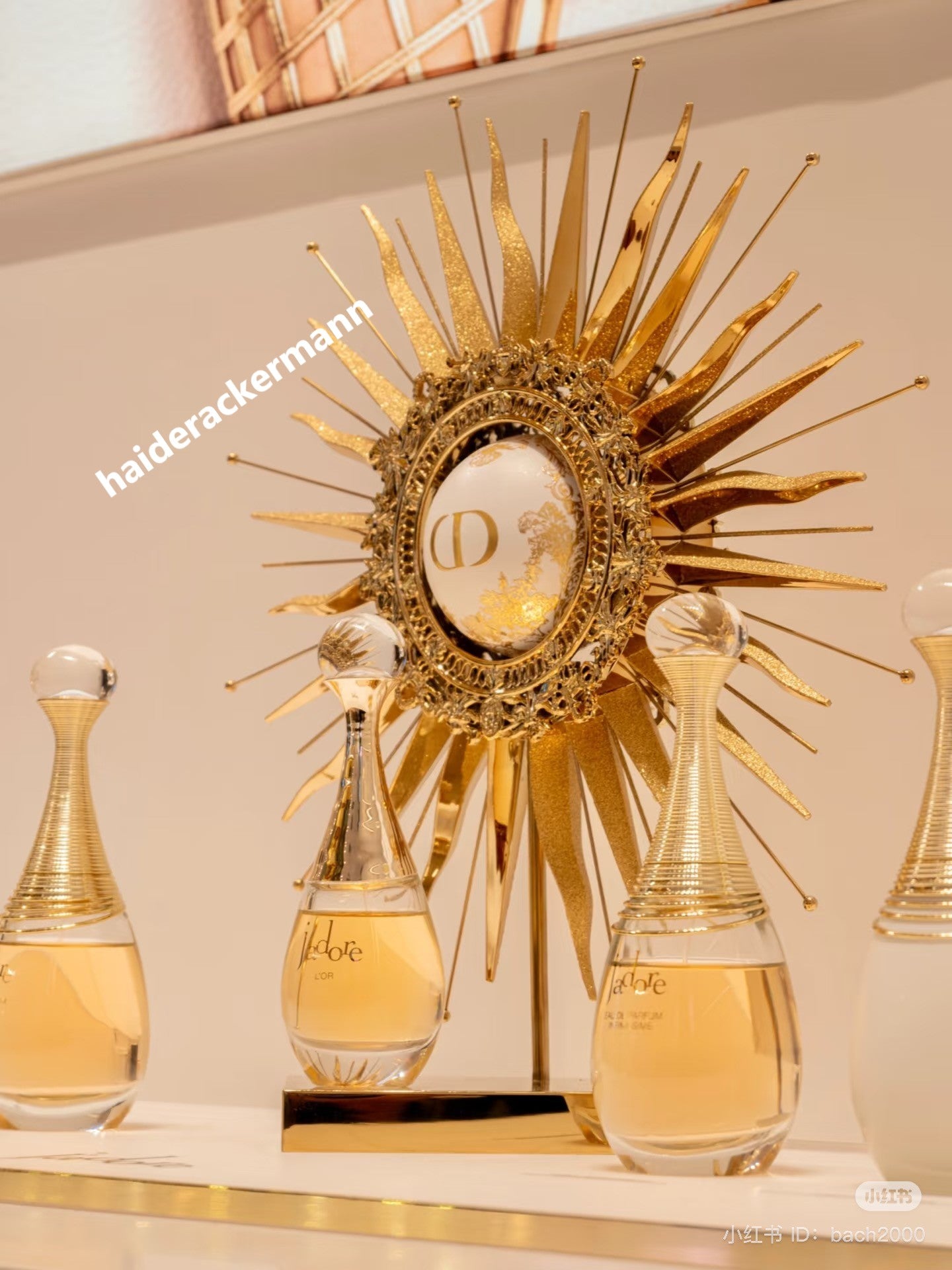 Dior 2024 christmas sun star gold metal stand for window display