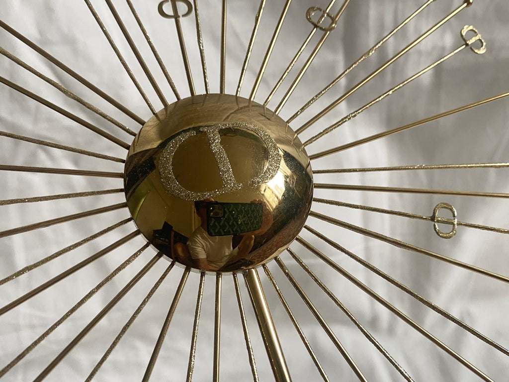 Dior 2024 Christmas CD logo gold metal sun stand for window display