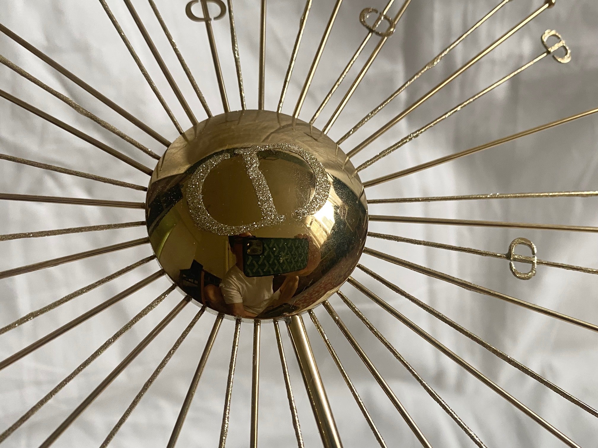 Dior 2024 Christmas CD logo gold metal sun stand for window display