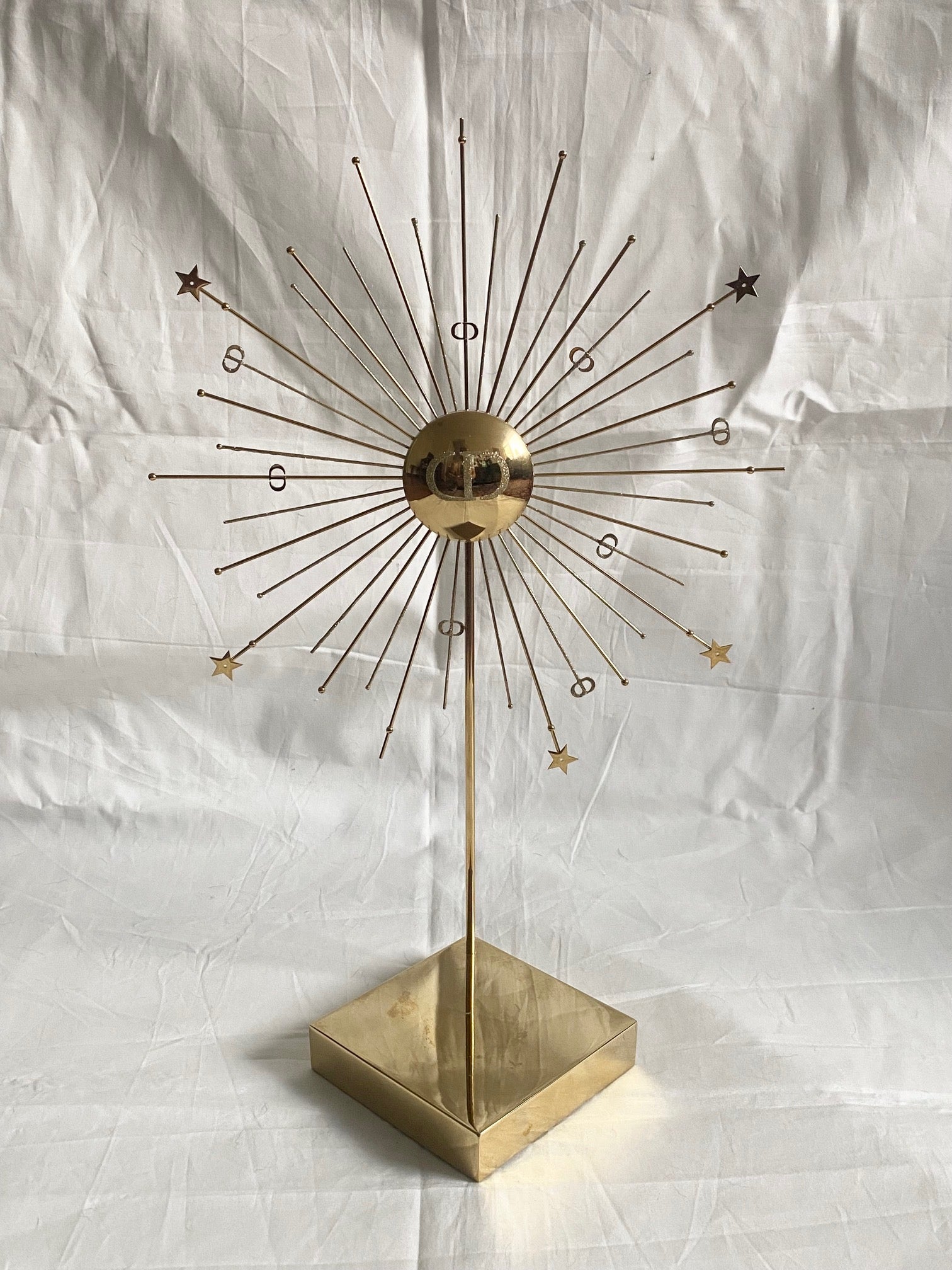 Dior 2024 Christmas CD logo gold metal sun stand for window display