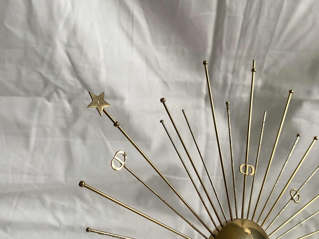 Dior 2024 Christmas CD logo gold metal sun stand for window display