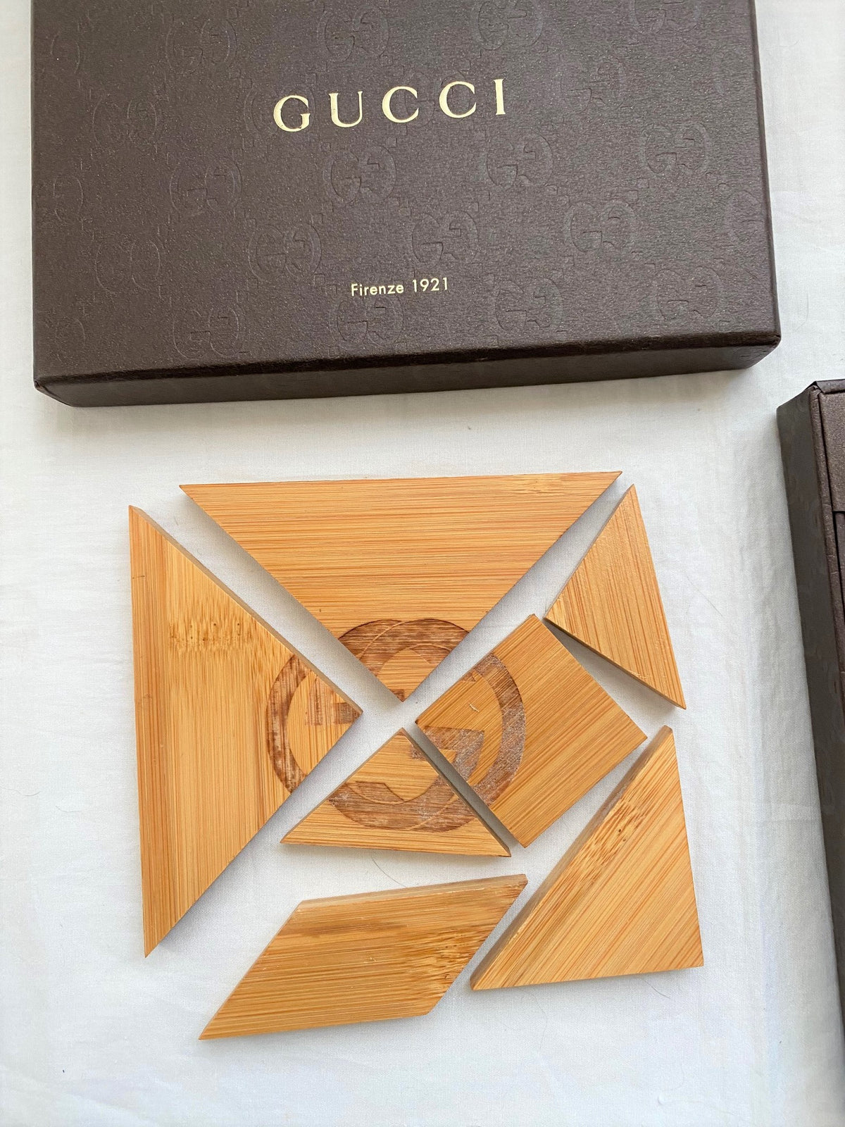 Gucci gg logo wooden jigsaw tangram puzzle