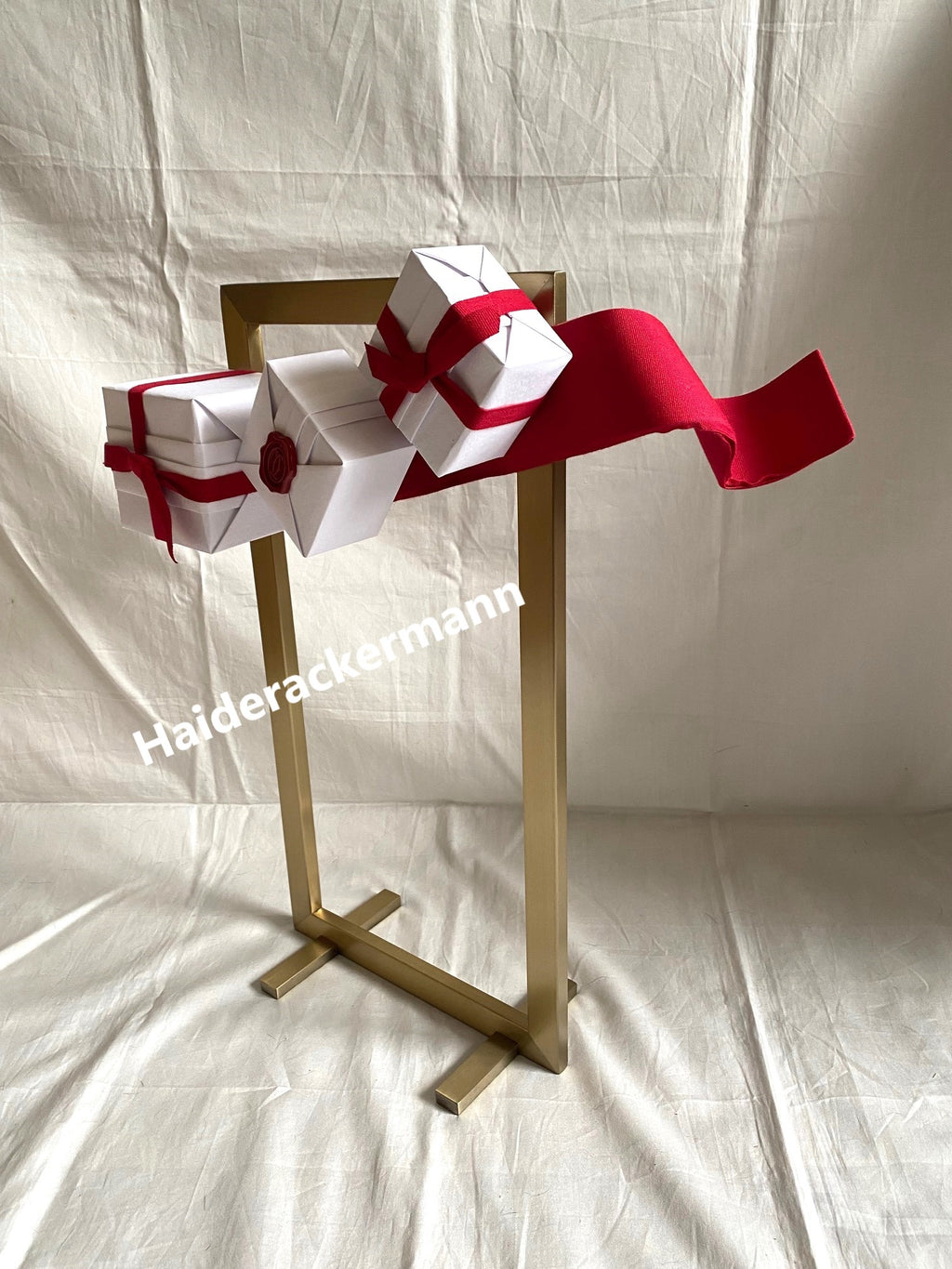 Cartier 2015 X'mas metal stand with white gift boxes for window display