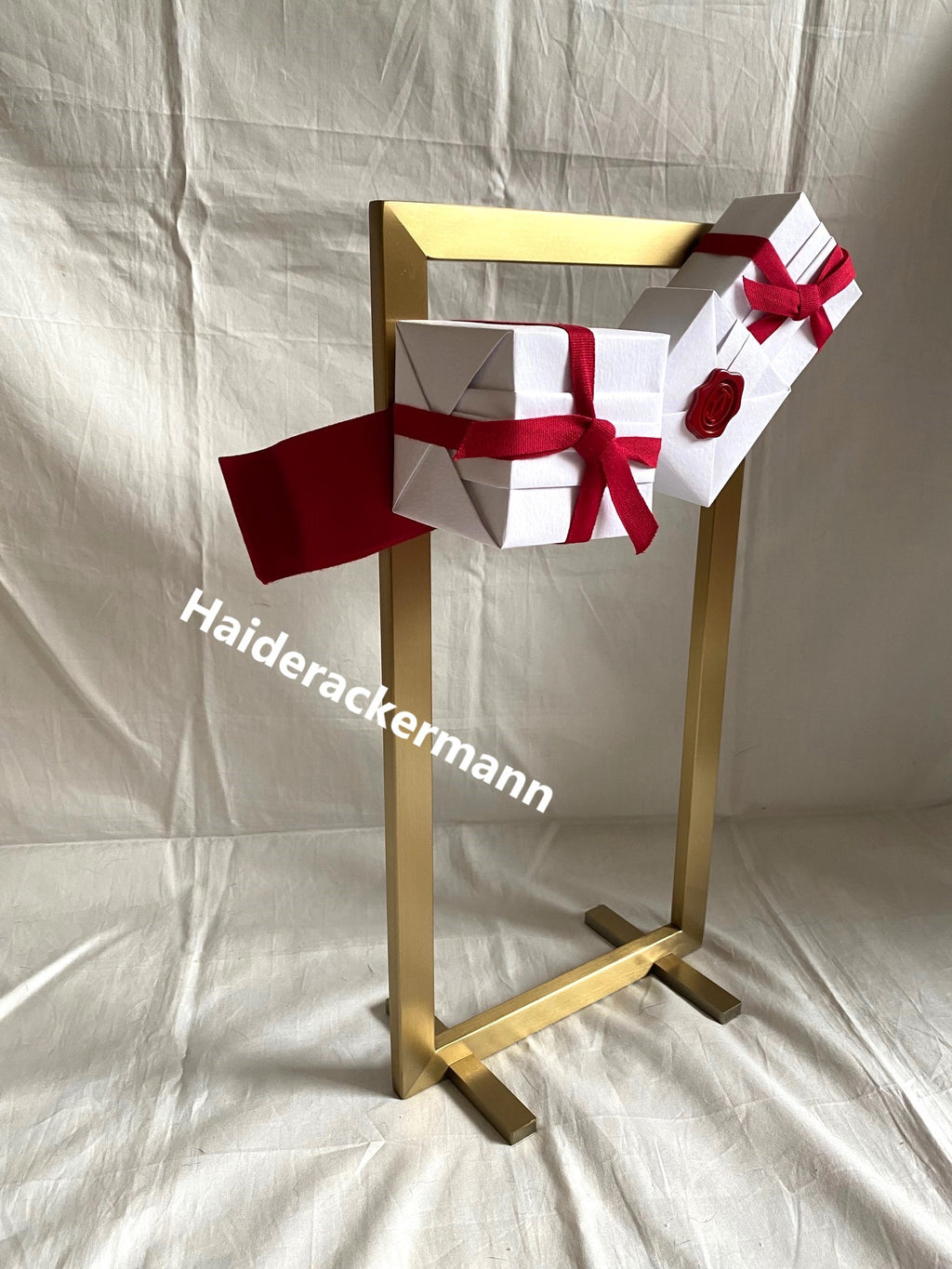 Cartier 2015 X'mas metal stand with white gift boxes for window display