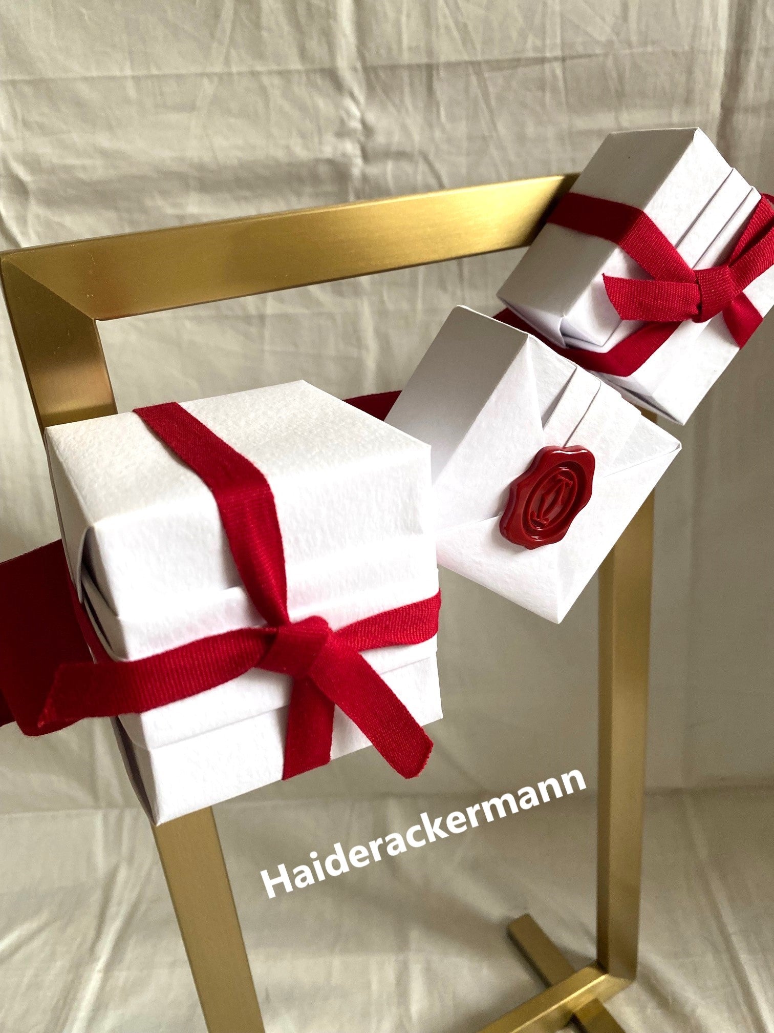 Cartier 2015 X'mas metal stand with white gift boxes for window display