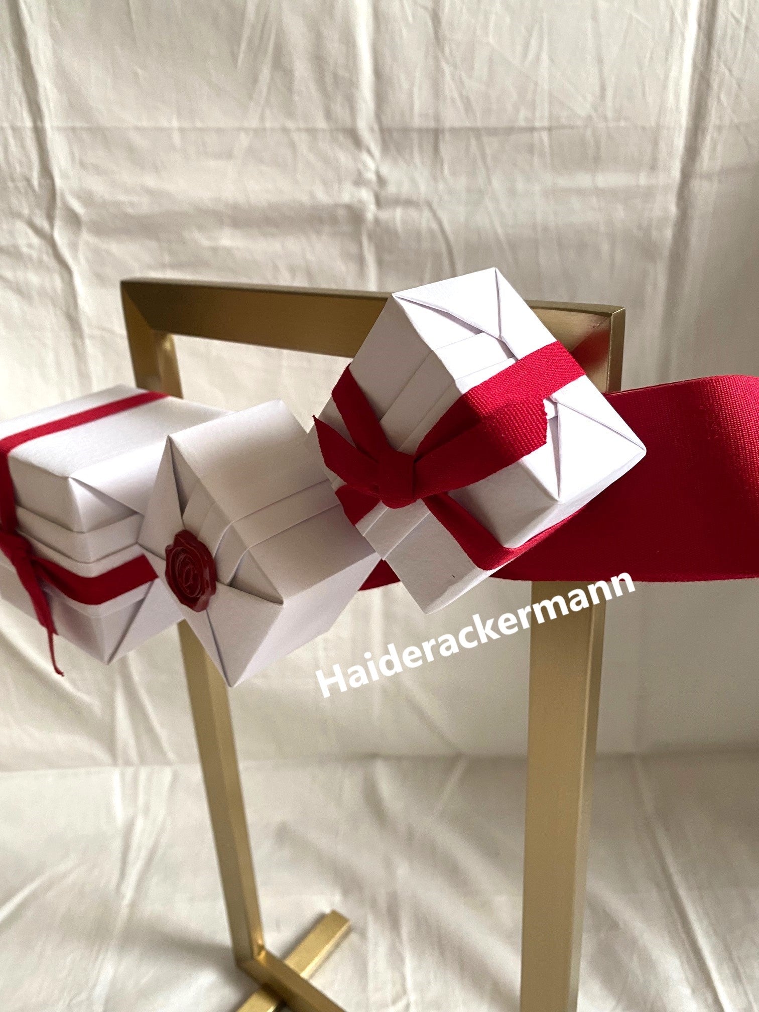 Cartier 2015 X'mas metal stand with white gift boxes for window display