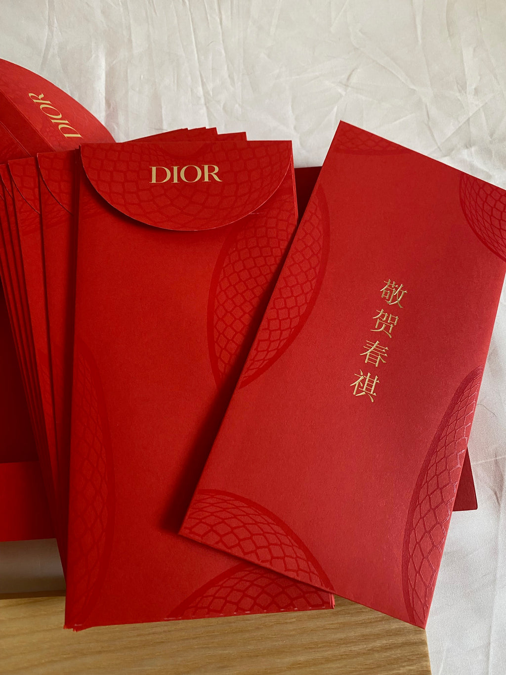 Dior by Kim Jones X Kaws 2025 Chinese new year snake wood plate & red packet set