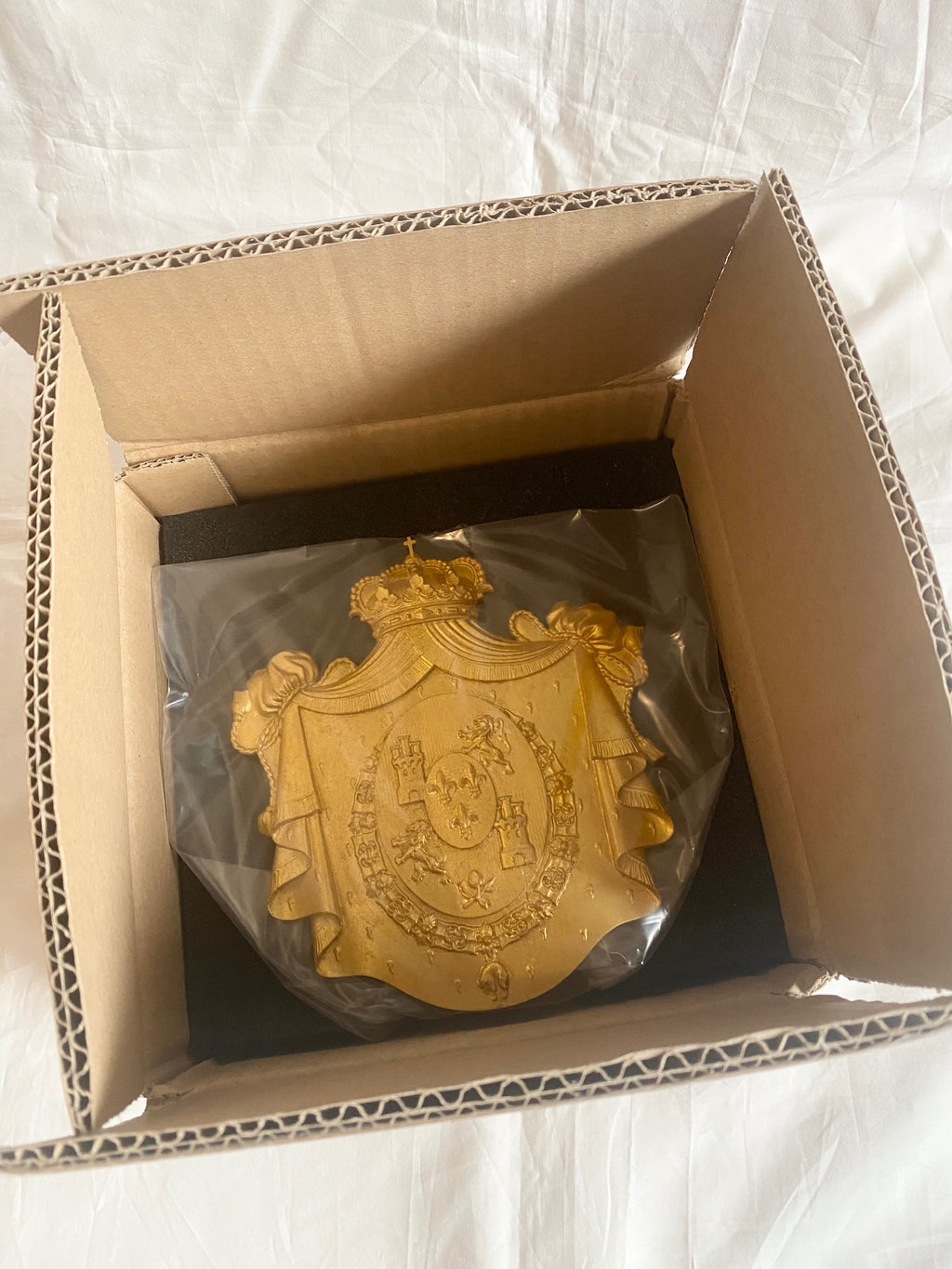 Cartier 2019 gold family crest arm of coat stand