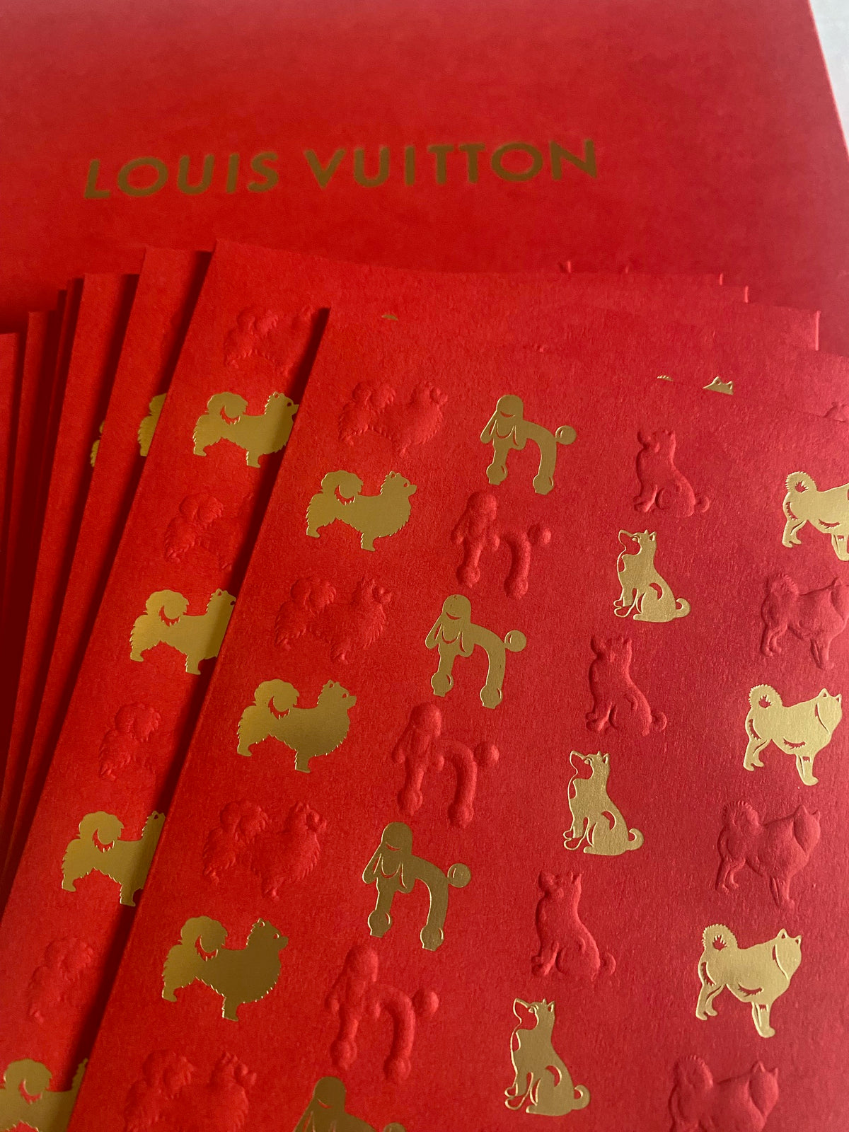 Louis Vuitton 2018 Chinese New Year red packet with dog motifs