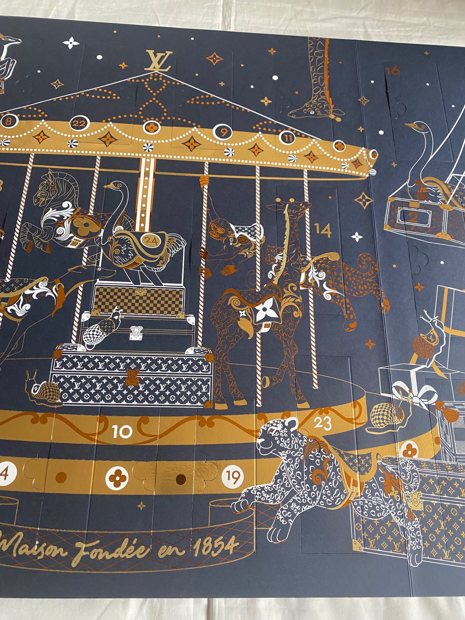 Louis Vuitton 2024 Christmas ornament calendar with trunk design