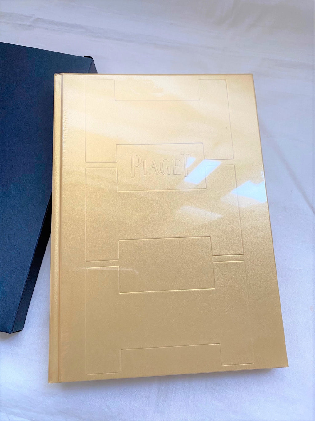 Piaget gold color notebook diary
