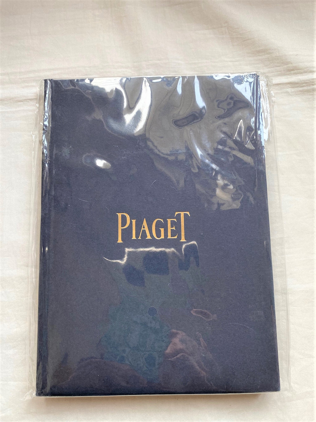 Piaget gold color notebook diary