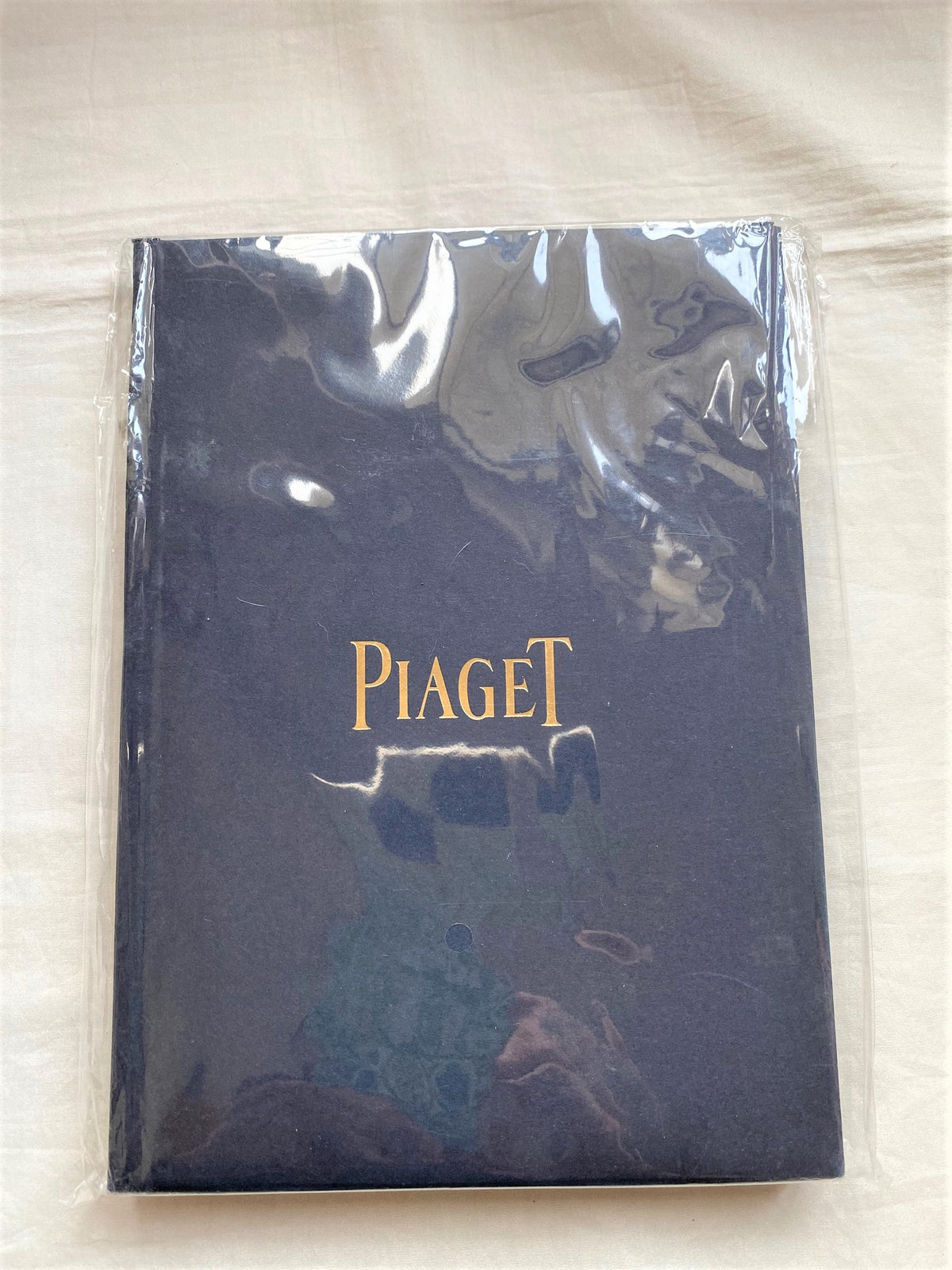 Piaget gold color notebook diary