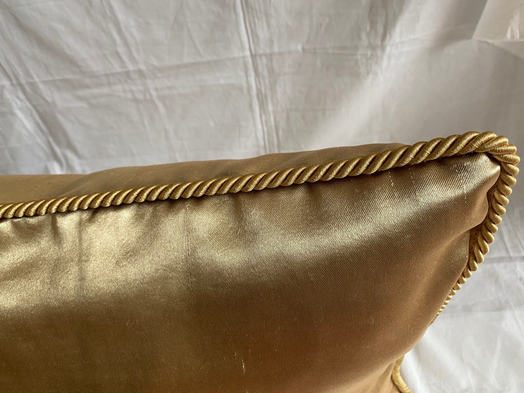 Cartier Christmas event gold satin cushion