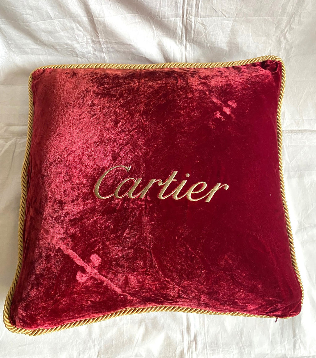 Cartier Christmas event red velvet cushion