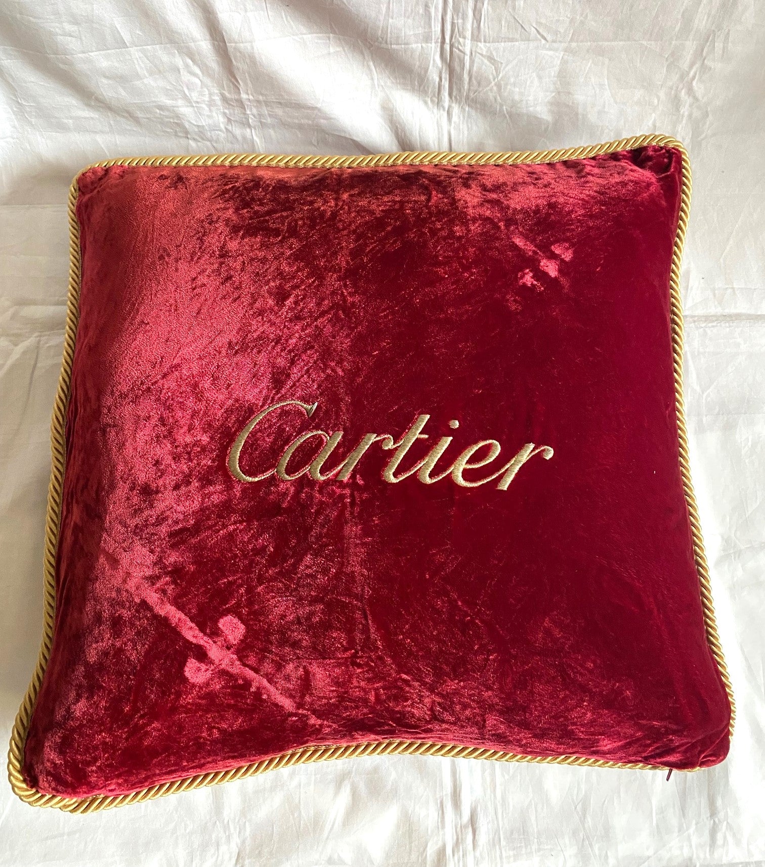 Cartier Christmas event red velvet cushion
