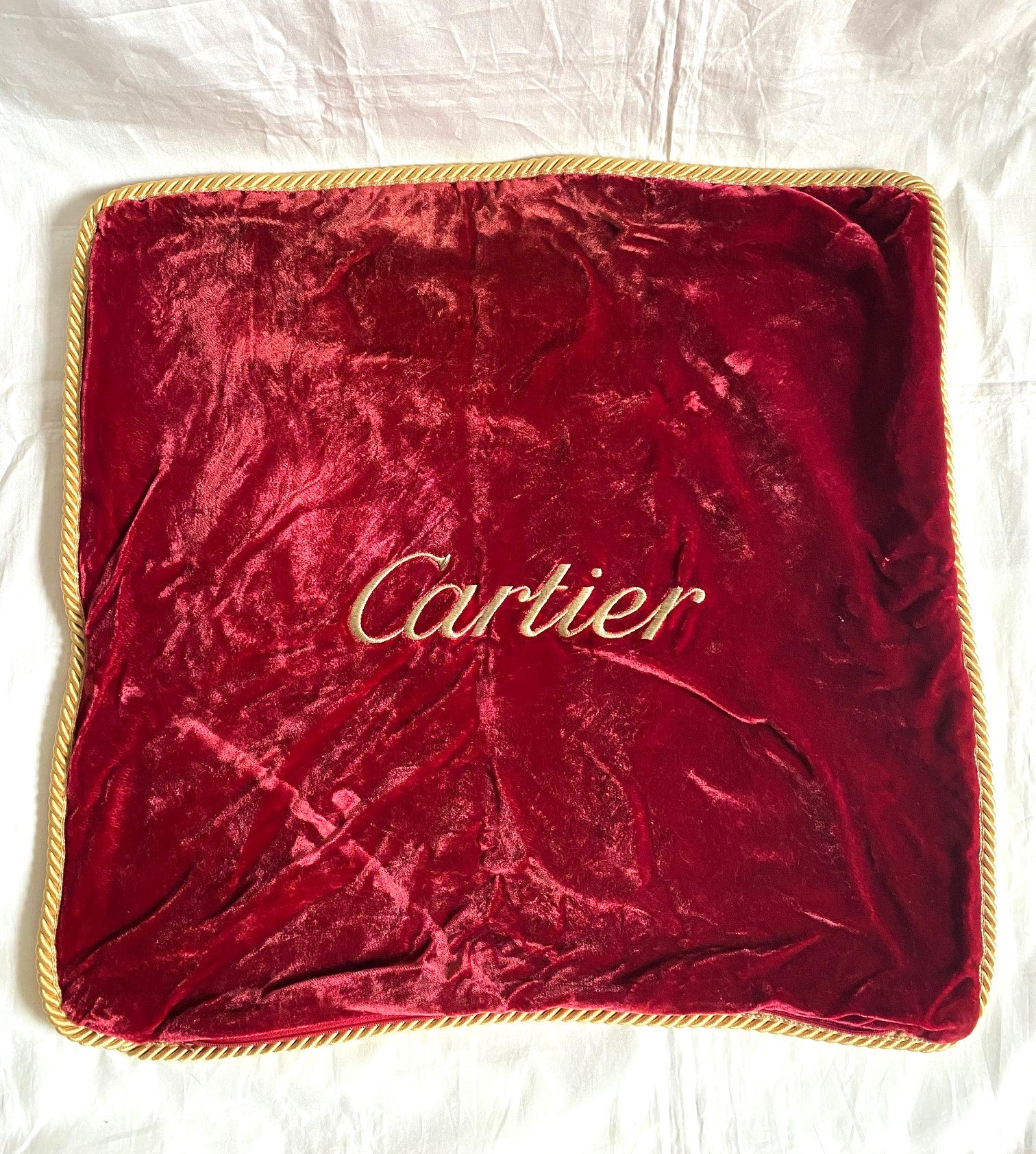 Cartier Christmas event red velvet cushion