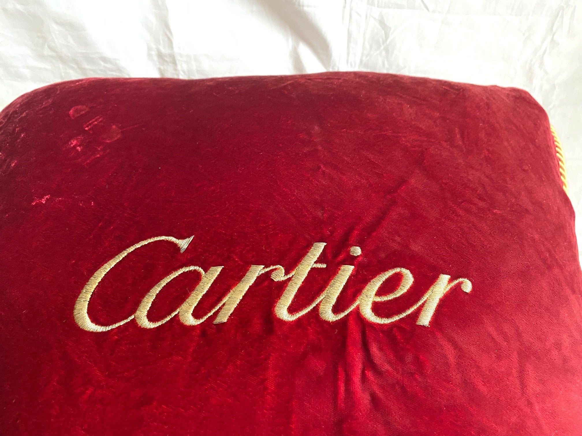 Cartier Christmas event red velvet cushion