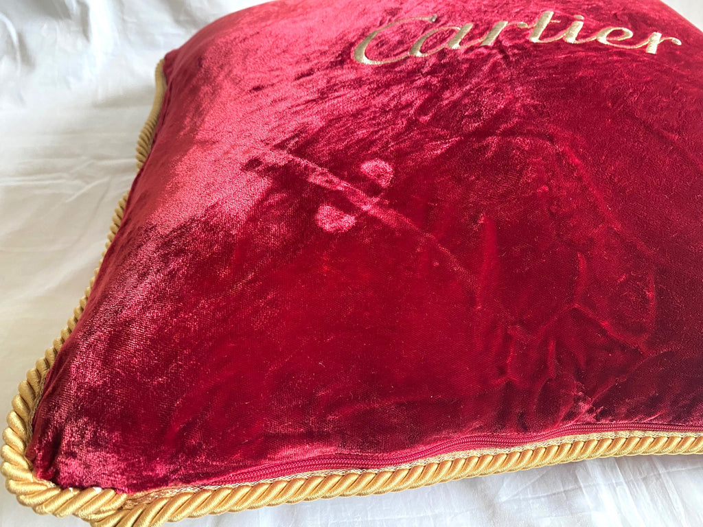 Cartier Christmas event red velvet cushion