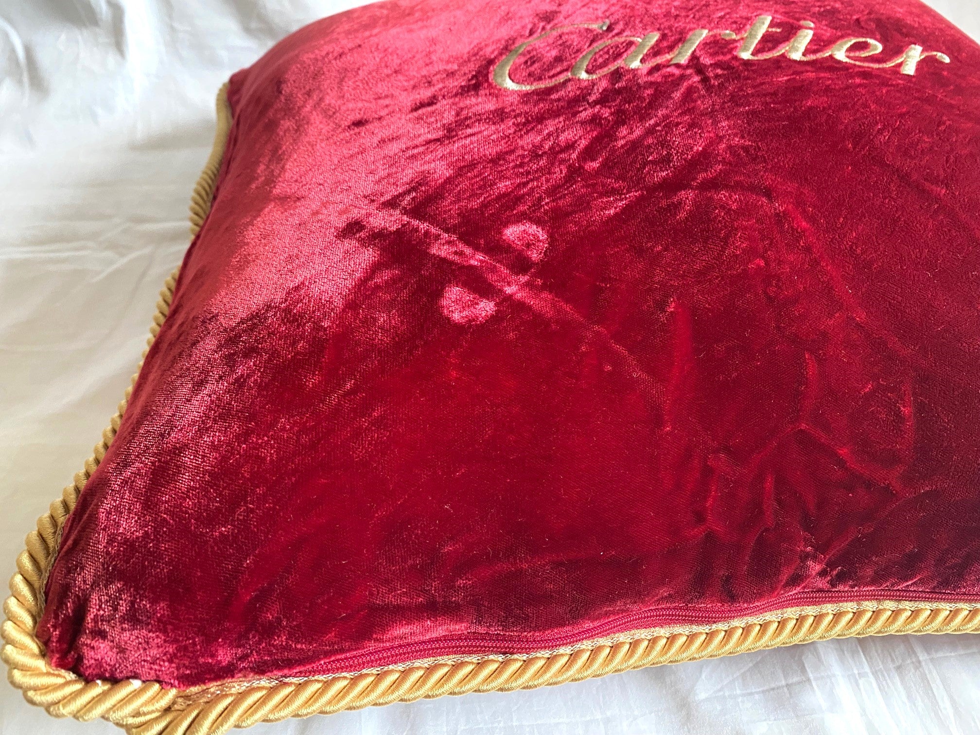 Cartier Christmas event red velvet cushion
