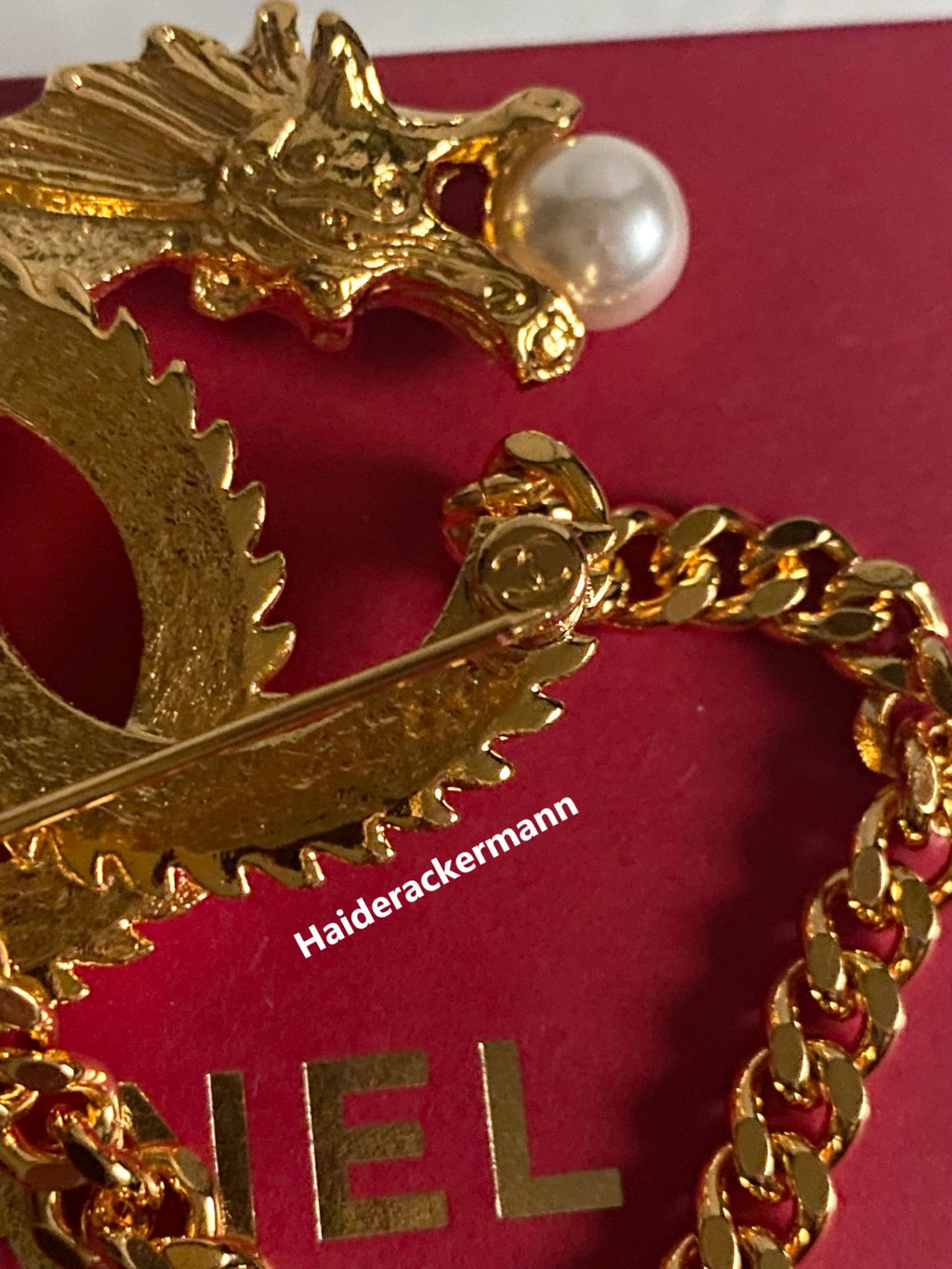 Chanel 2024 Chinese New Year gold dragon cc logo with pearl & chain brooch