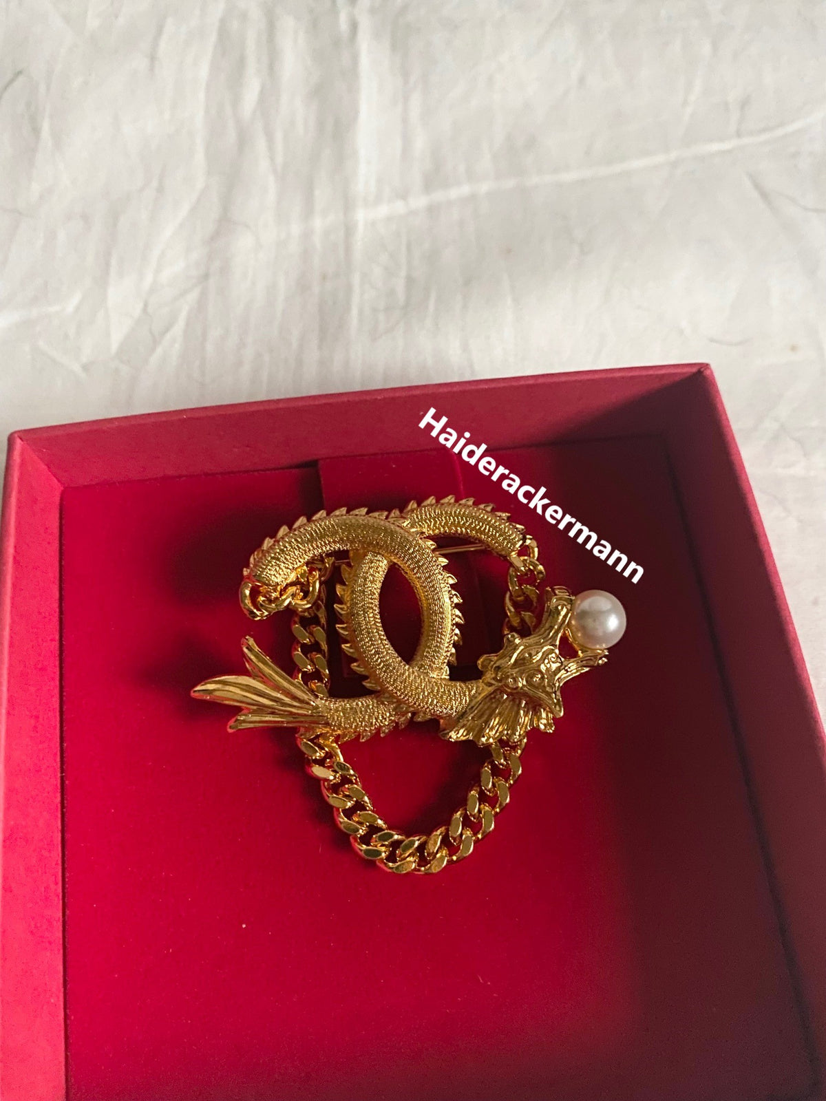 Chanel 2024 Chinese New Year gold dragon cc logo with pearl & chain brooch