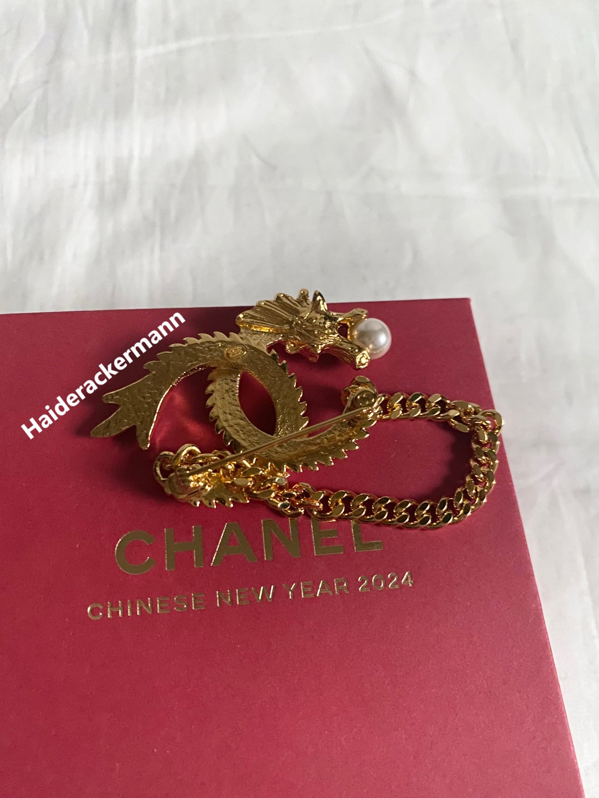 Chanel 2024 Chinese New Year gold dragon cc logo with pearl & chain brooch