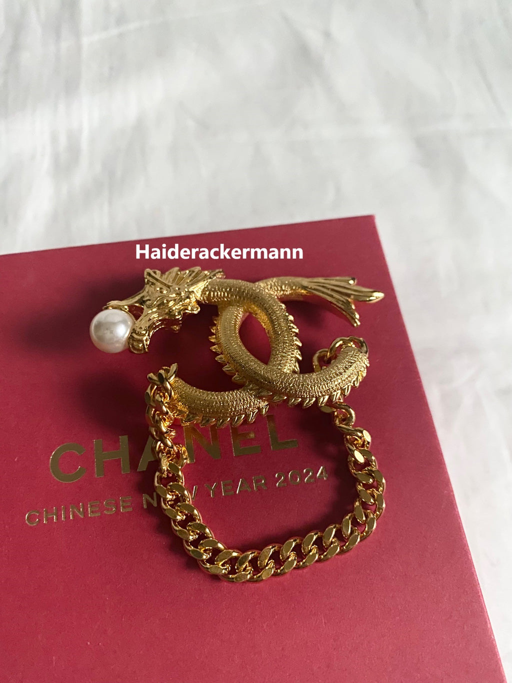 Chanel 2024 Chinese New Year gold dragon cc logo with pearl & chain brooch