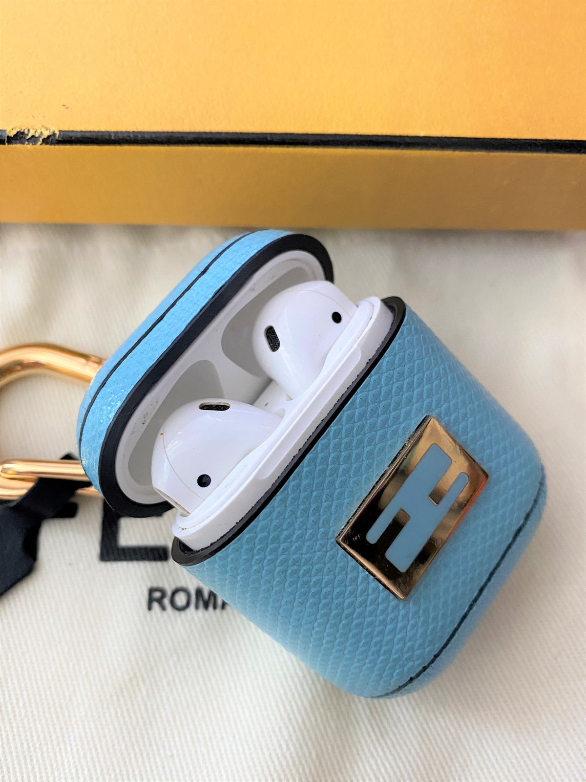 Fendi blue snakeskin AirPods case