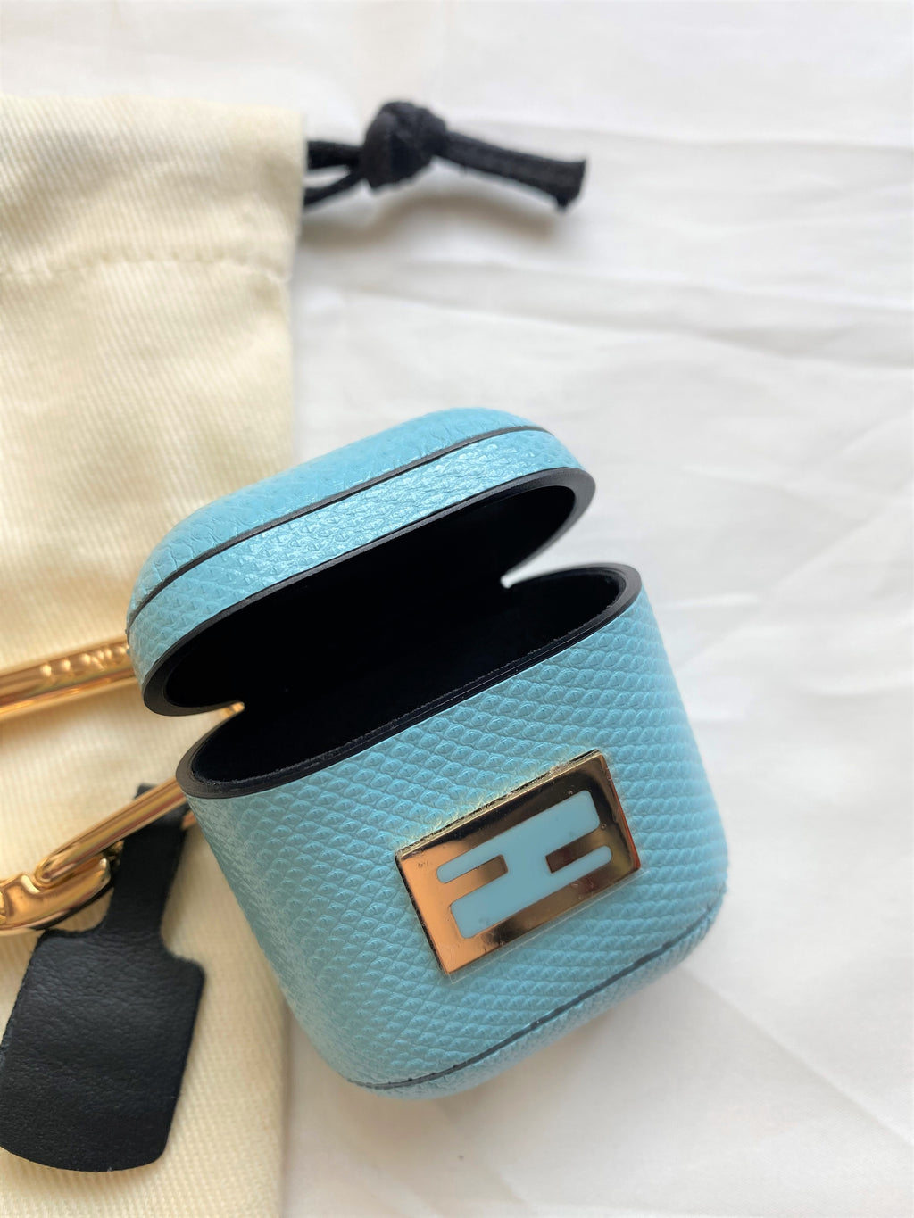 Fendi blue snakeskin AirPods case