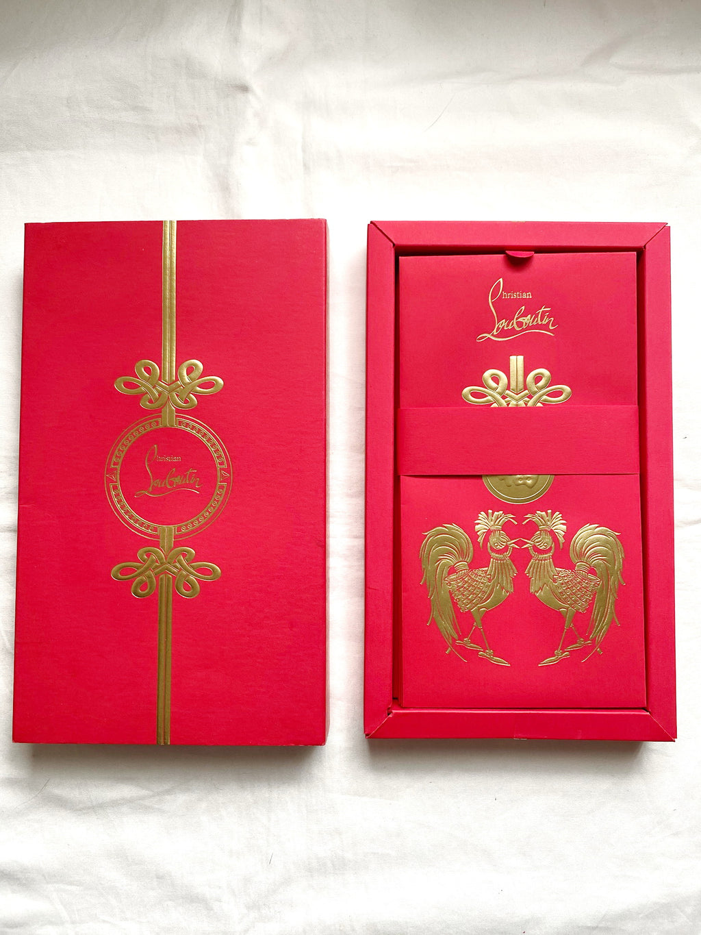 Christian Louboutin 2017 Chinese New Year red packet with rooster motifs