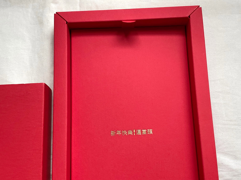 Christian Louboutin 2017 Chinese New Year red packet with rooster motifs