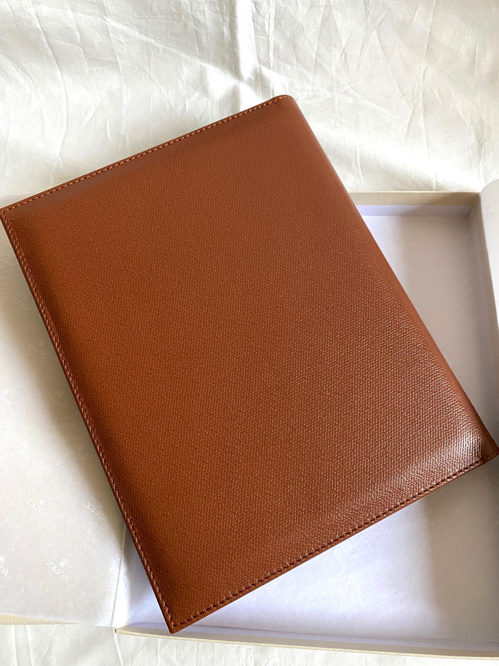 Rolex notebook with leather case & Caran d’Ache pen