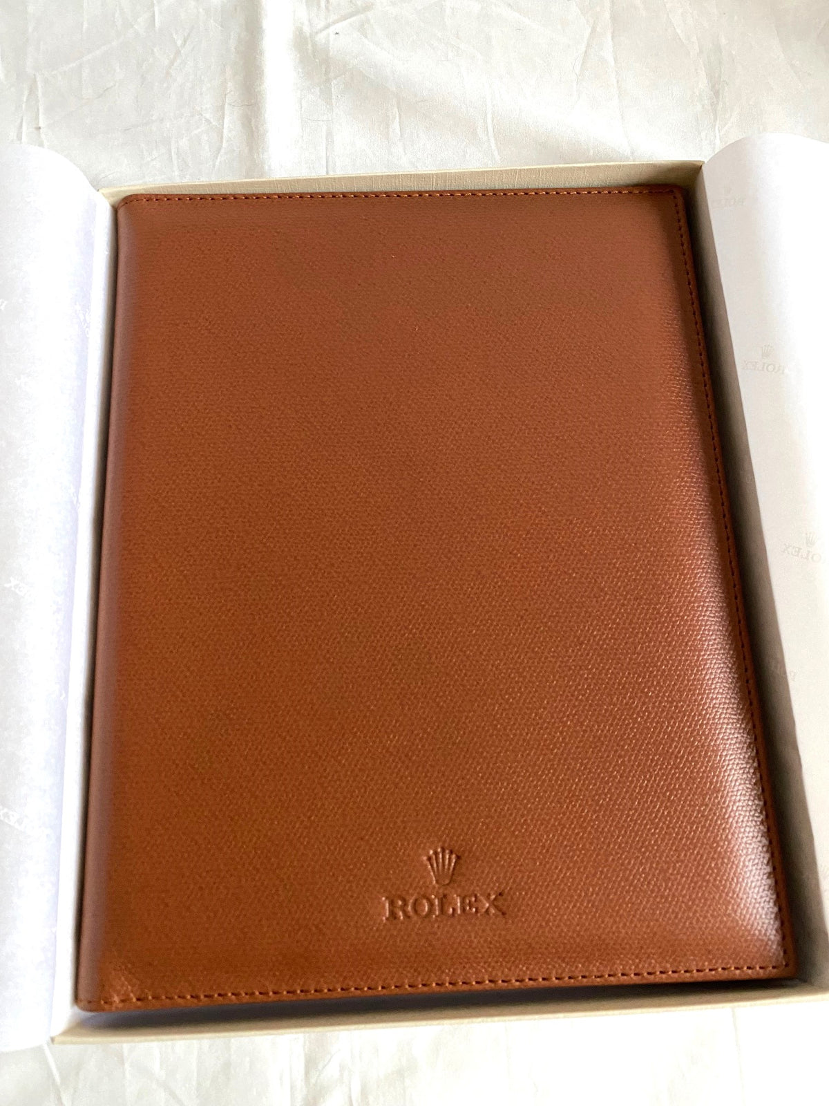 Rolex notebook with leather case & Caran d’Ache pen