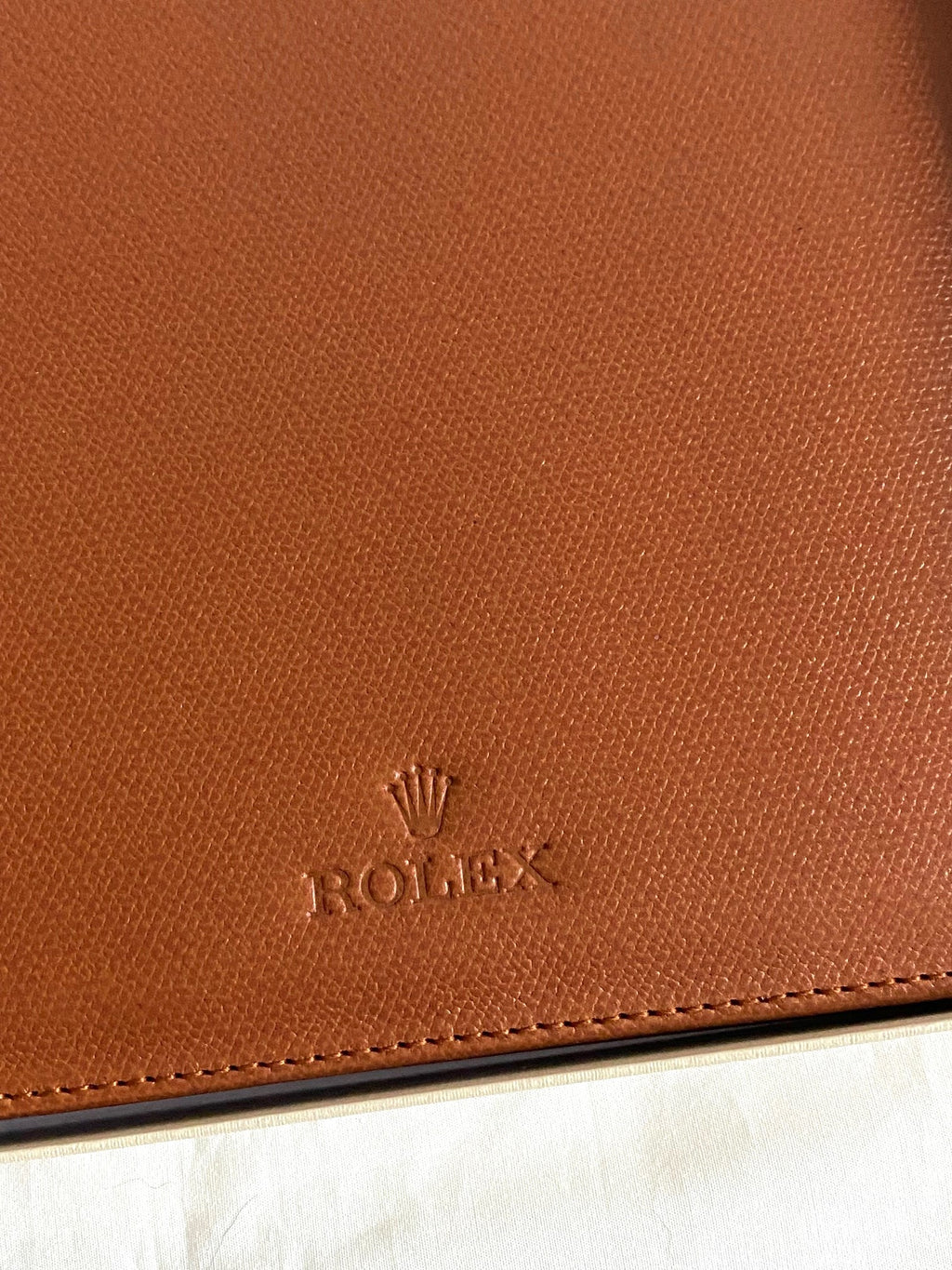 Rolex notebook with leather case & Caran d’Ache pen