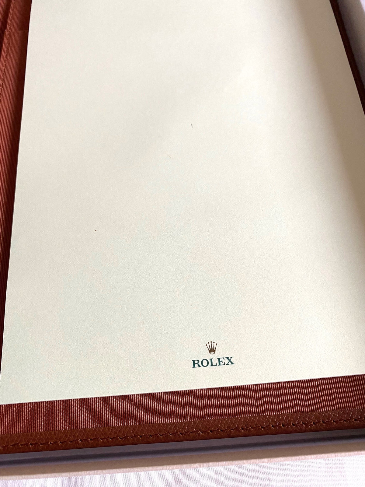 Rolex notebook with leather case & Caran d’Ache pen