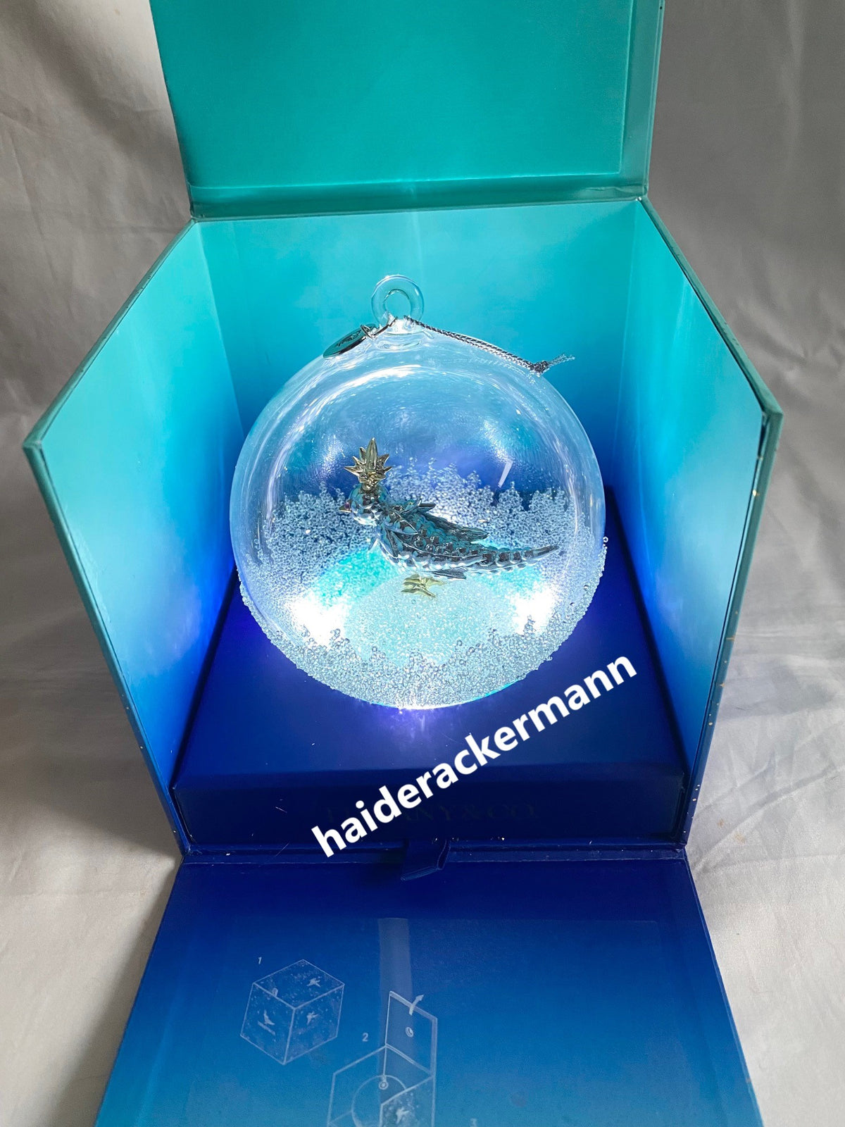 Tiffany & Co 2024 Christmas bird on a rock crystal glass ornament